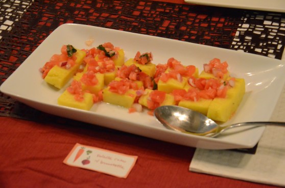 Polenta cakes with tomato bruschetta.