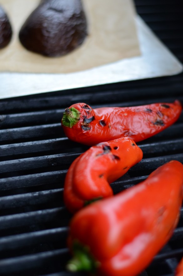 The blacker they get, the easier they are to peel.  These were a challenge.