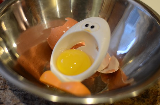 Does anyone have ideas, in general, for putting one egg yolk to good use, so I don't have to toss it?