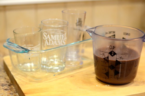 It's easier to transport the fudgesicles to and from the freezer if you corral them in a single container, like this Pyrex.